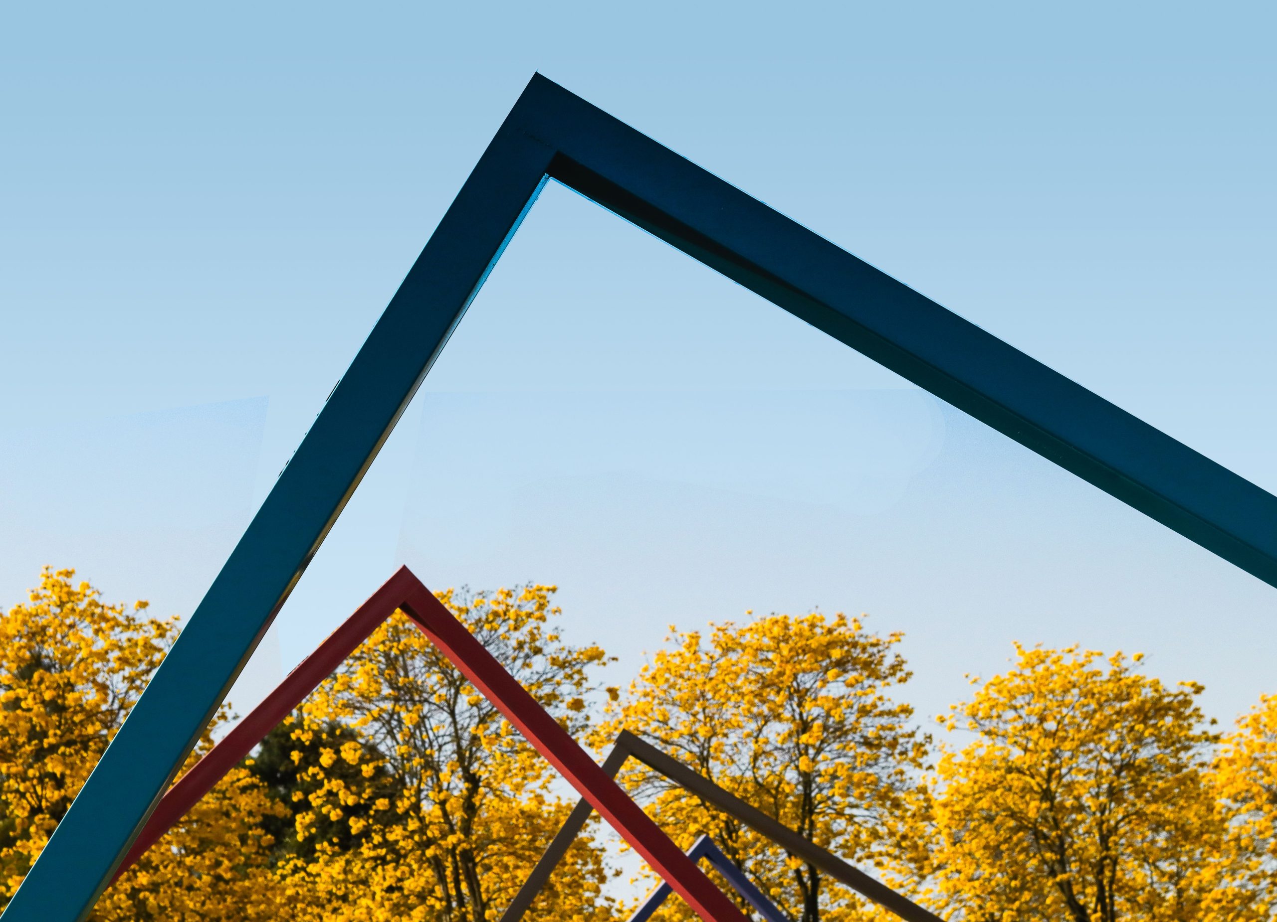 Colorful geometric structures against blue sky